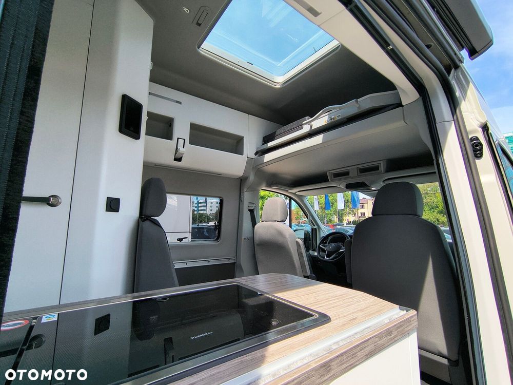 Volkswagen Crafter Grand California 600 silnik: 2,0 l TDI EU6 SCR BlueMotion Technology 130 kW skrzynia biegów: Przedni napęd automatyczna 8-biegowa rozstaw osi: 3640 mm - 30