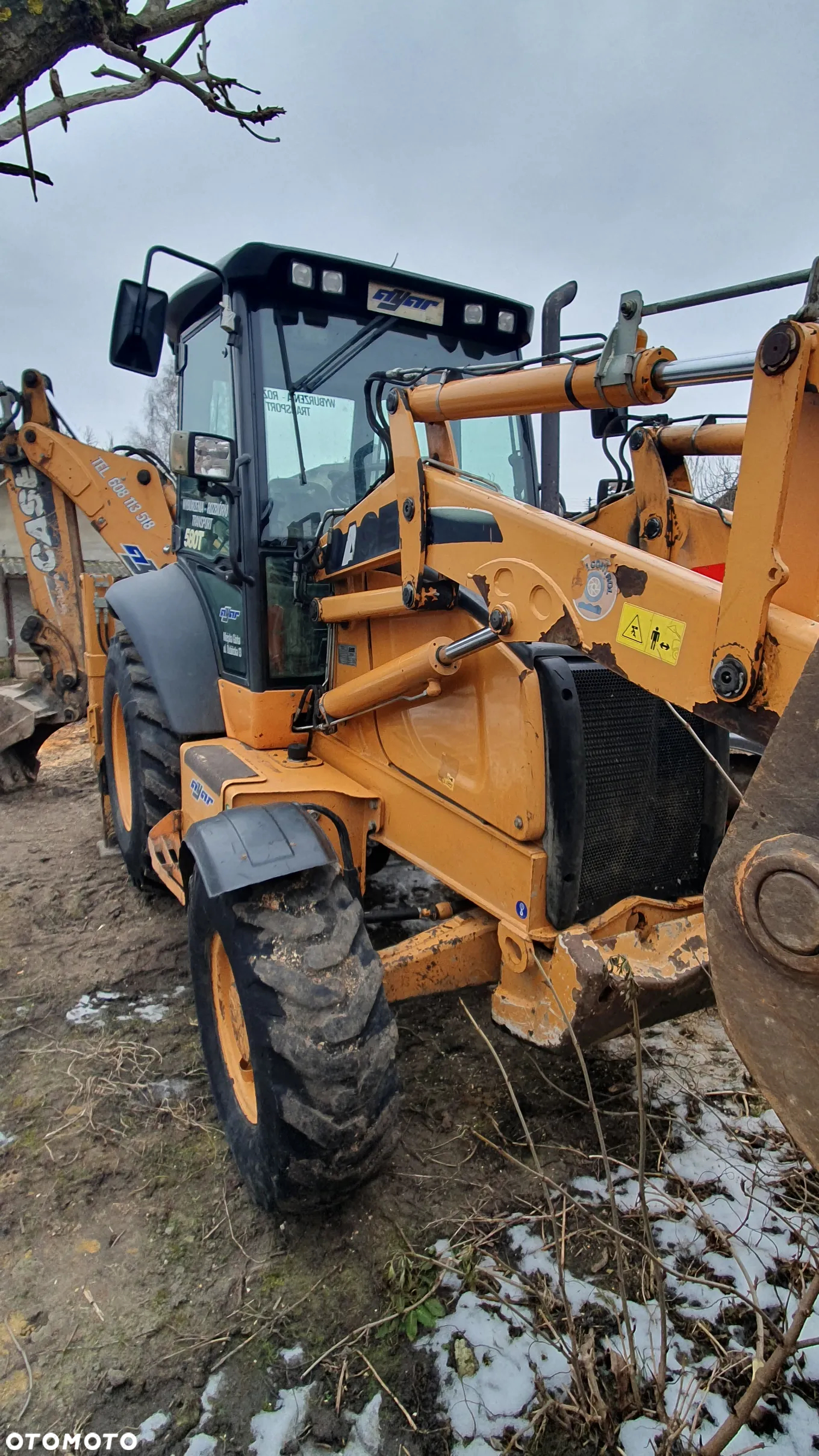 Case 580 T - 11