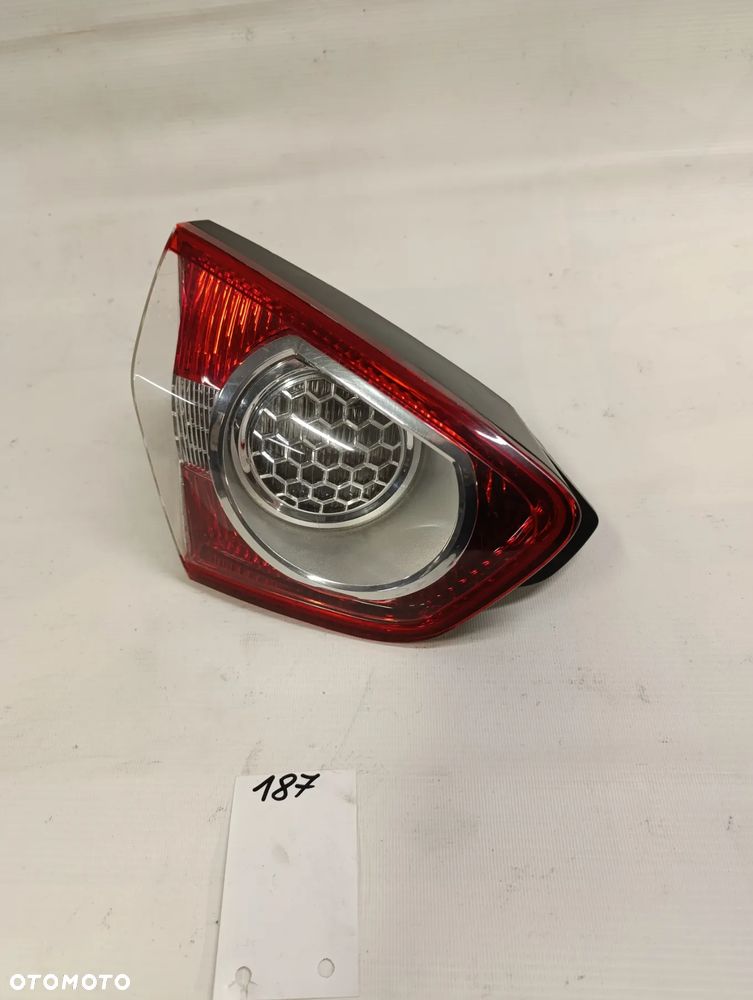 KUGA MK1 LAMPA LEWY TYŁ TYLNA W KLAPĘ