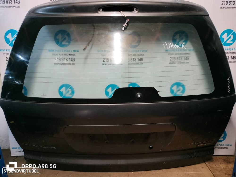 Tampa da Mala Chrysler Grand Voyager - 1