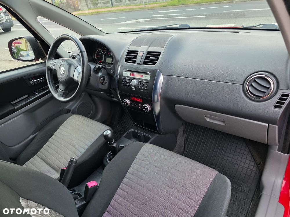 Suzuki SX4 1.6 Comfort Plus - 9