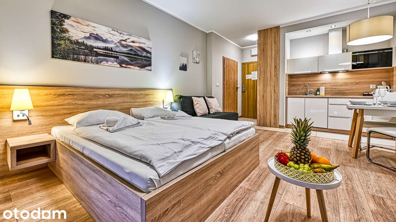 Komfortowy apartament z miejscem parkingowym i balkonem.