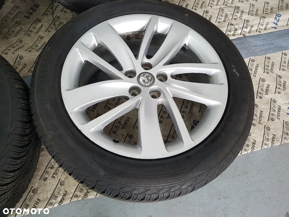 KOŁA CAŁOROCZNE OPEL MOKKA TRAX  5X105  7JX18  215/55R18  215/55/18 - 15