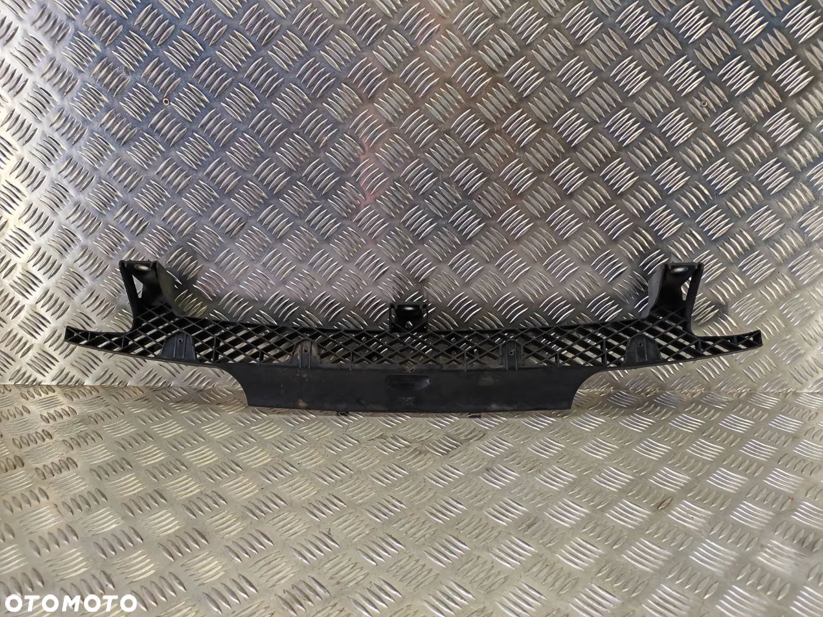 VW TOUAREG II 7P LIFT 10-15R SLIZG MOCOWANIE UCHWYT ZDERZAKA GRILLA PRZOD 7P6807200 - 1