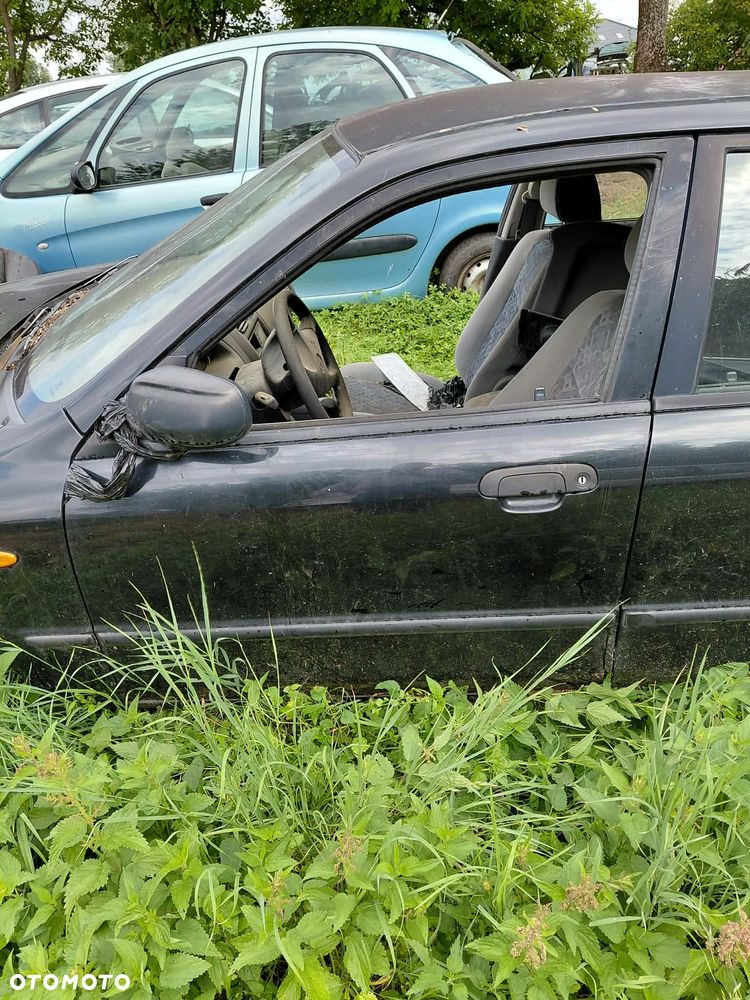 części DRZWI przód lewe TYŁ prawe lewe 16W MAZDA 323F 2002r 1.5 benzyna hatchback - 1
