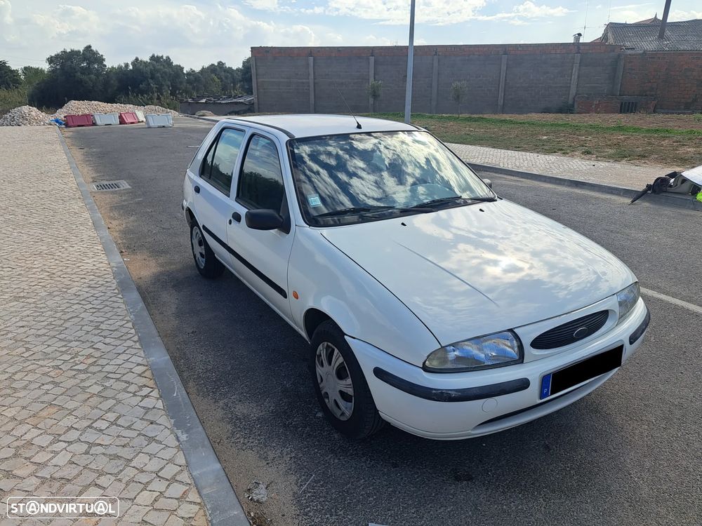 Mazda 121 1.25 - 10