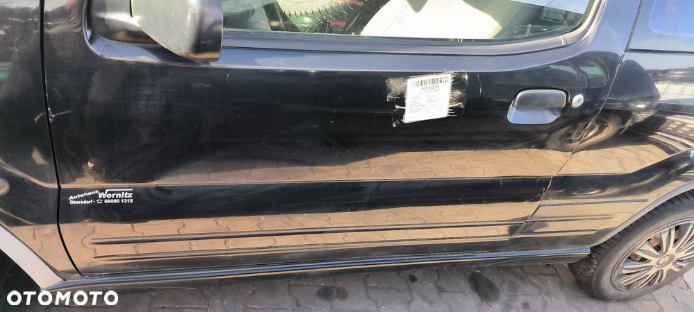 DRZWI LEWE PRZÓD SUZUKI IGNIS 2001 - 10