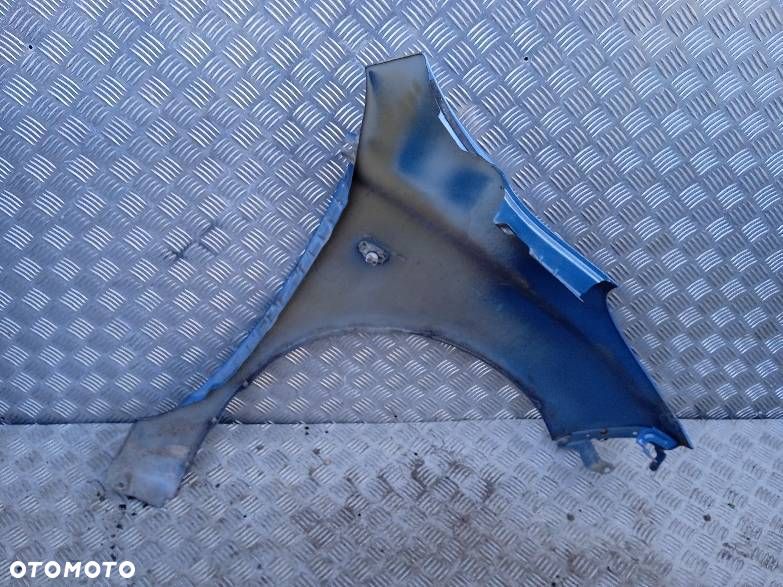 BŁOTNIK LEWY NISSAN MICRA K12 - 2