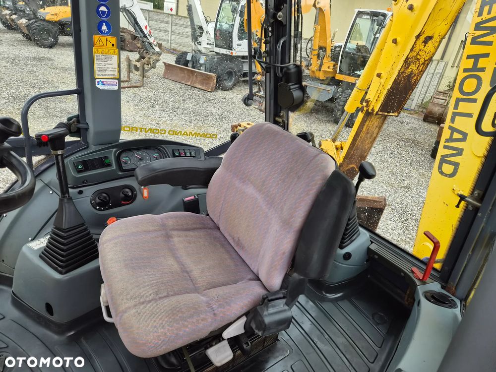New Holland LB 115 - 13