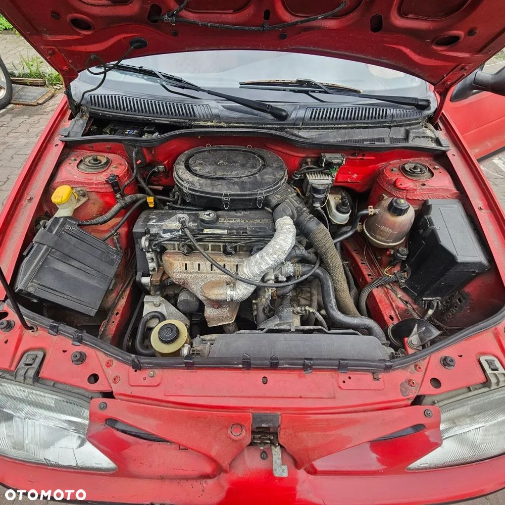 Renault Megane (1996) 1,4 B 55 kW / 75 KM (kod lak: 727 pojazd na części - 10