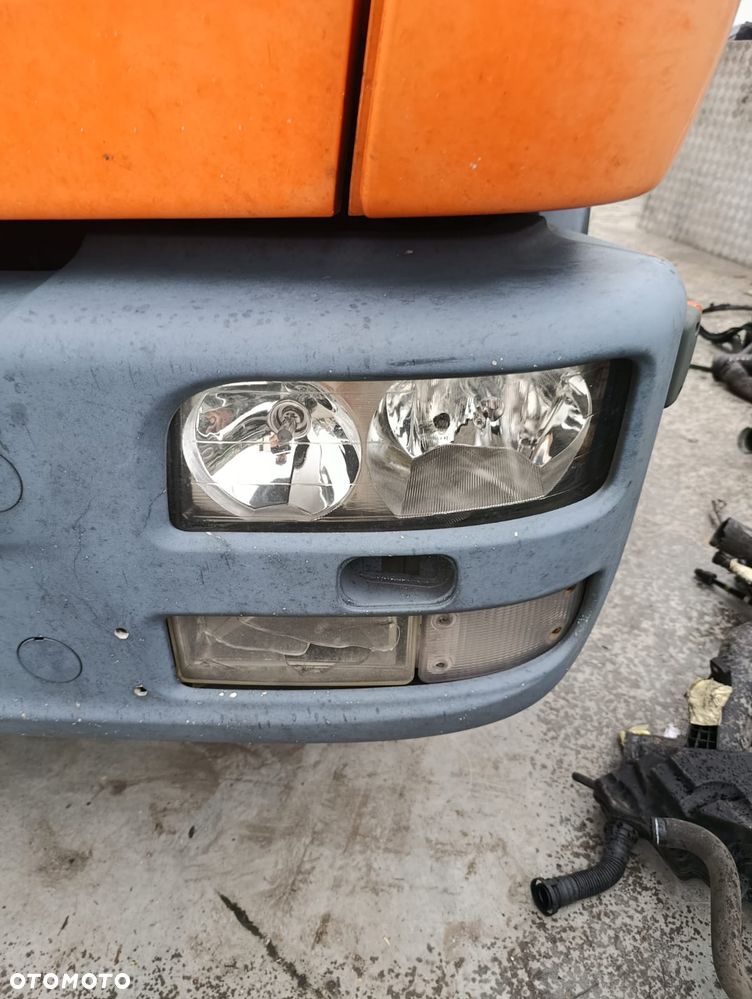 HALOGEN MAN TGL LEWY Z KIERUNKOWSKAZEM BIAŁYM 81.25320-6113 - 2