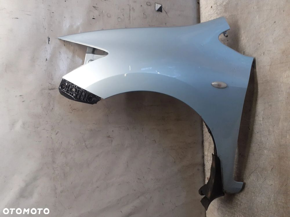 * BŁOTNIK LEWY PRZÓD  PRZEDNI TOYOTA AURIS I 8S1 BŁEKITNY - 1