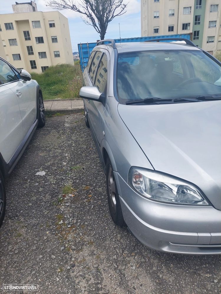 Opel Astra Caravan 1.9 CDTi Cosmo - 1