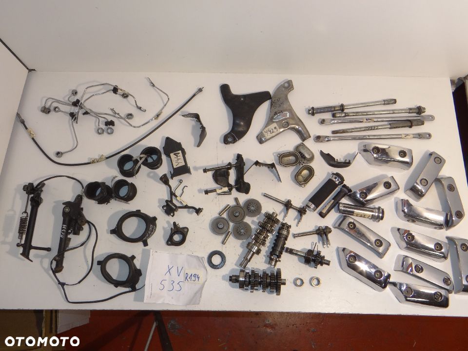 XV 535 pokrywa głowicy osłona oska koła tył stopka boczna skrzynia biegów króciec gaźnika  R194