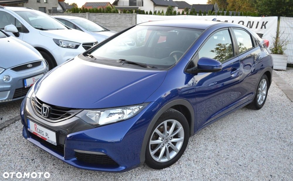 Honda Civic 1.4 i-VTEC Comfort - 12