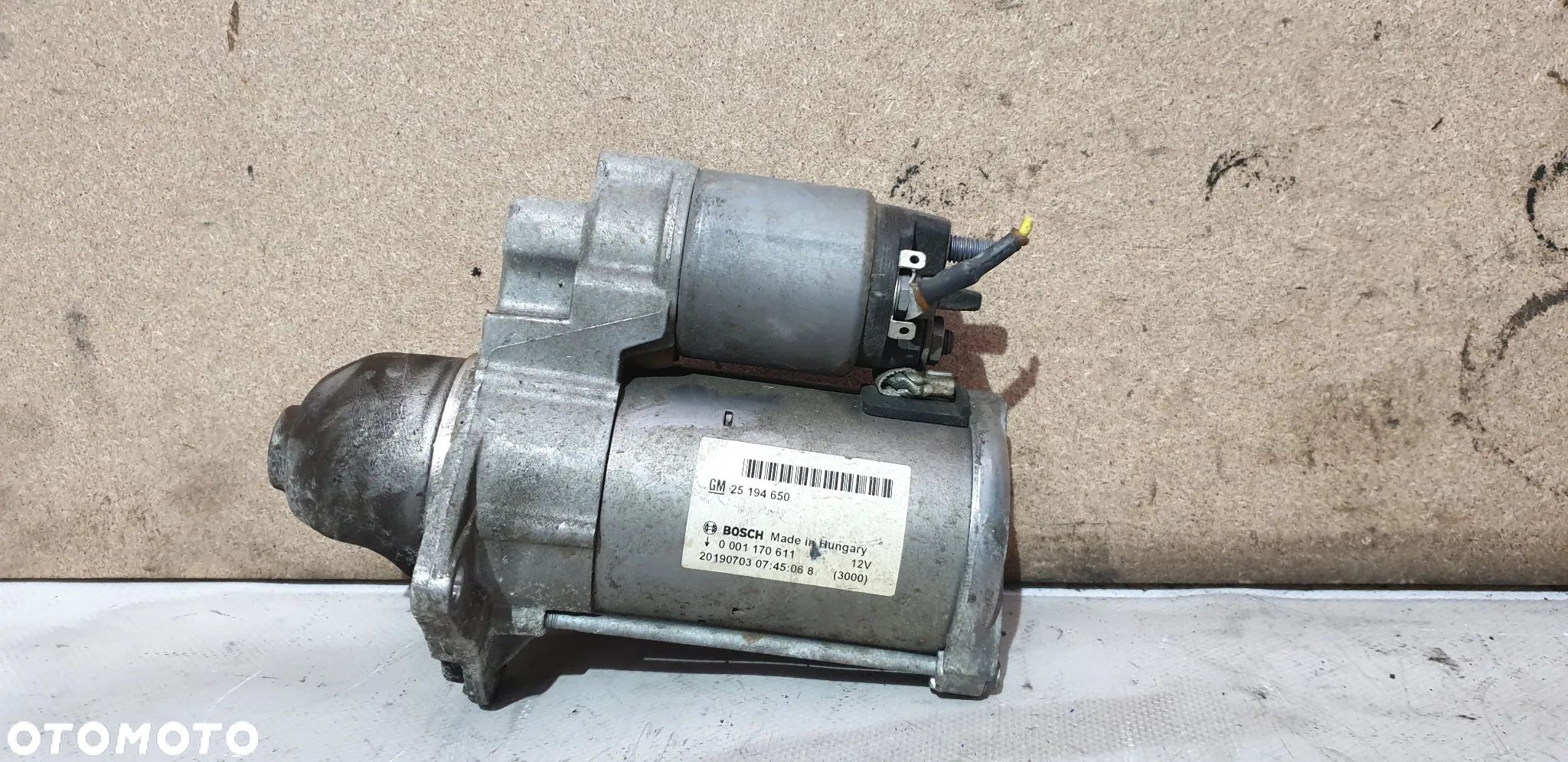 Opel Corsa E 1.4 B 2019r Rozrusznik 25194650 0001170611 - 1