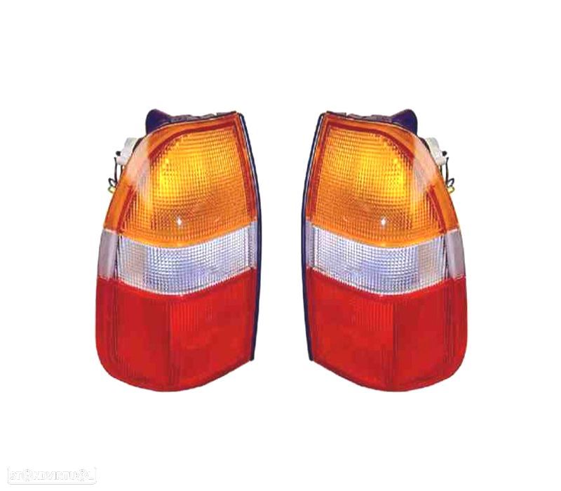 FAROLINS PARA MITSUBISHI L200 K74 96-06 - 1