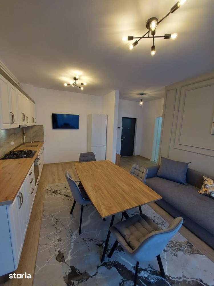 Apartament cu 3 camere,etaj intermediar,parcare subterana,zona Cetati — fotografia 1