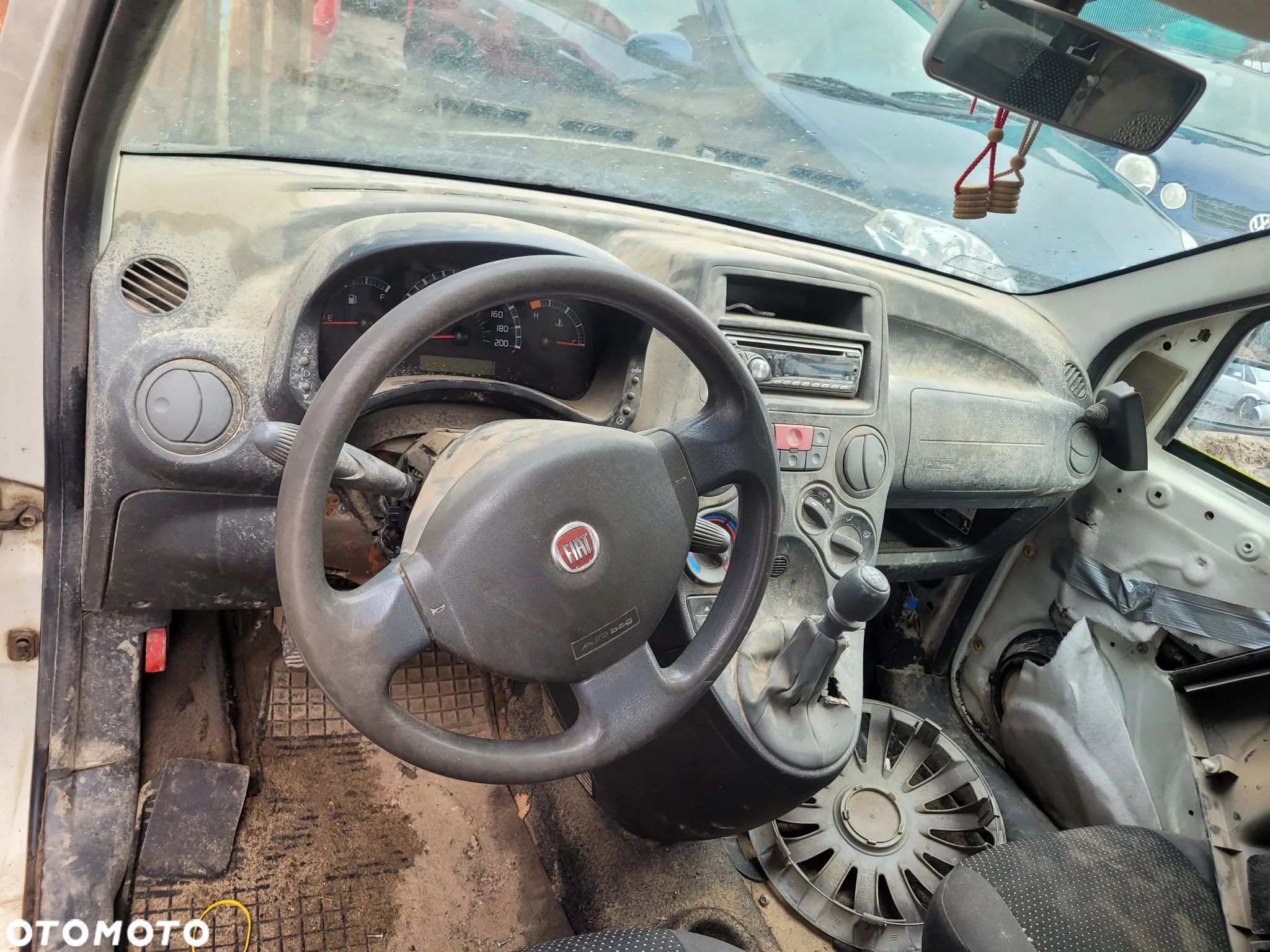 fiat panda II fotel kanapa deska kokpit podsufitka boczek podłokietnik licznik panel szyb stacyjka - 1
