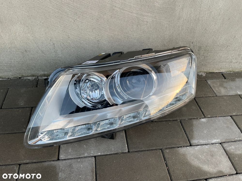 LAMPA PRZEDNIA LEWA AUDI A6 C6 LIFT  2008-2011 - NOWA HELLA BI-XENON - 1