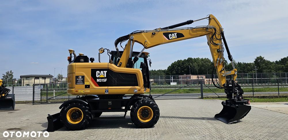 Caterpillar M315F (315F, M314F, M317F) TRIMBLE ROTOTILT TRS10 PRZYCZEPA - 12