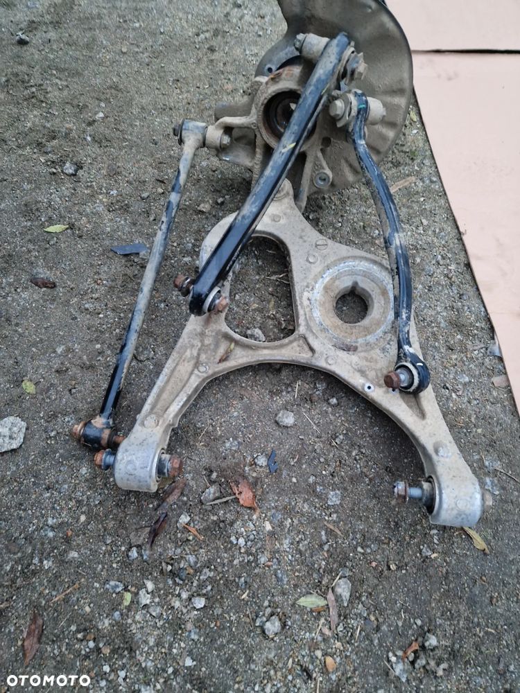 Mercedes ML GL zwrotnica lewy tył A16605 - 2