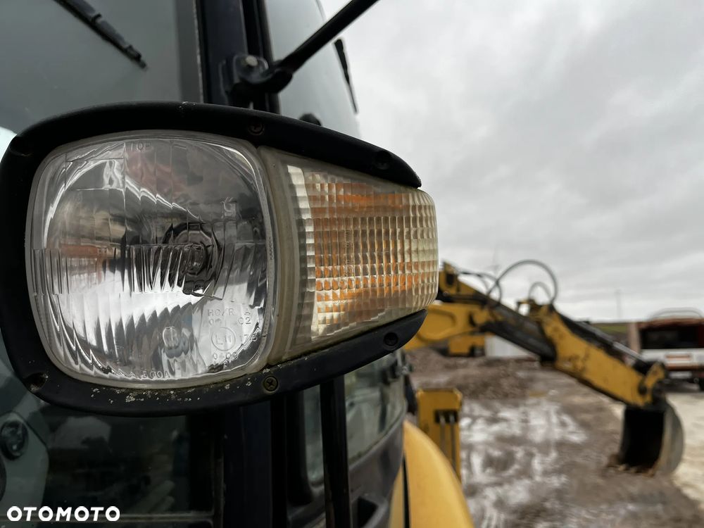 Caterpillar 428E - 10
