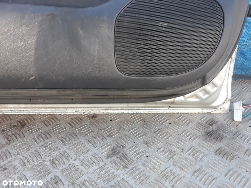 DRZWI LEWY PRZÓD TOYOTA AVENSIS II T25 LIFT 2007r  KOLOR: 1C0 - 9