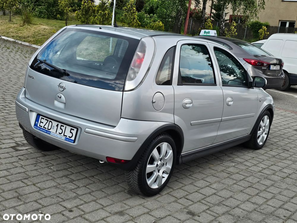 Opel Corsa 1.0 12V Edition mit TomTom GO - 13