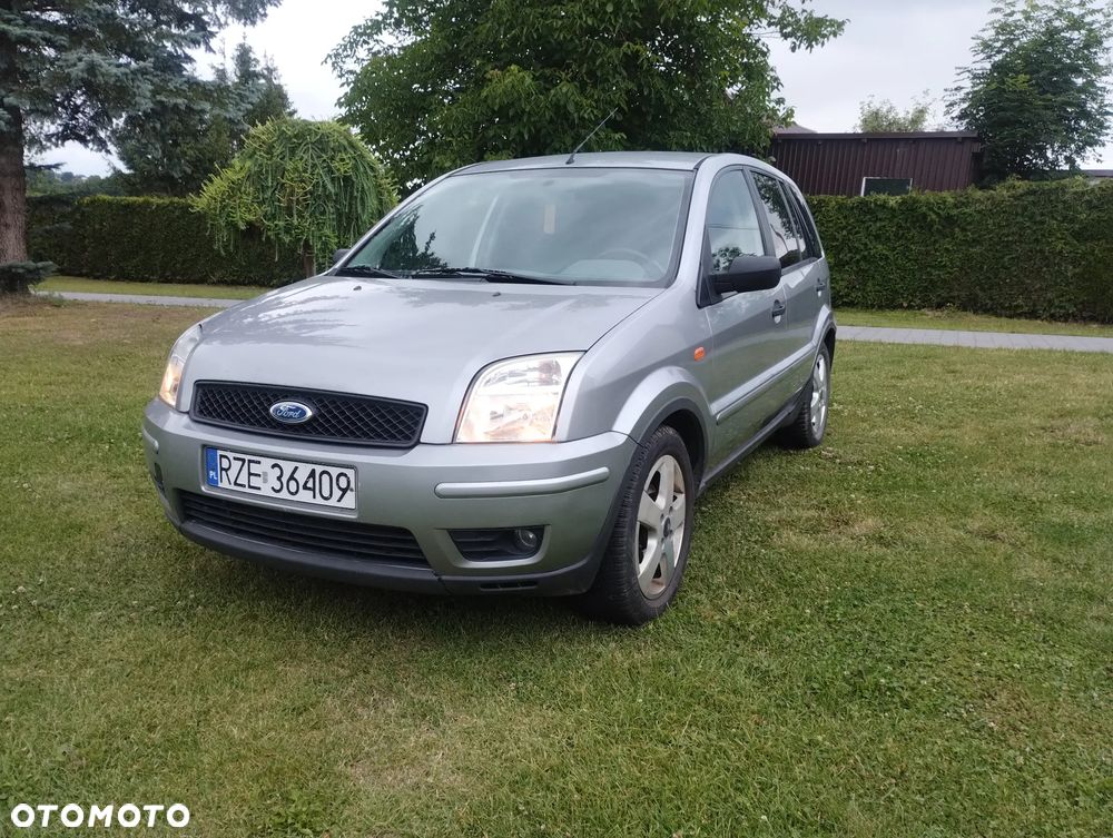 Ford Fusion 1.4 TDCI + - 12