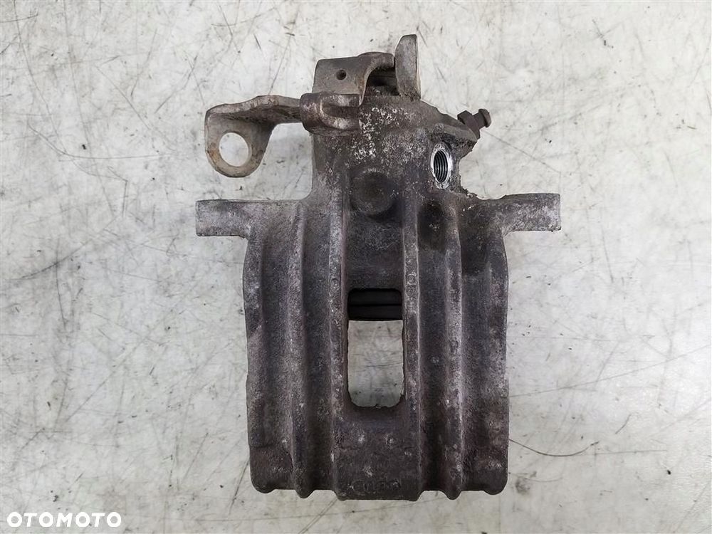 Zacisk hamulcowy tył prawy VW GOLF IV 1997R-2003R