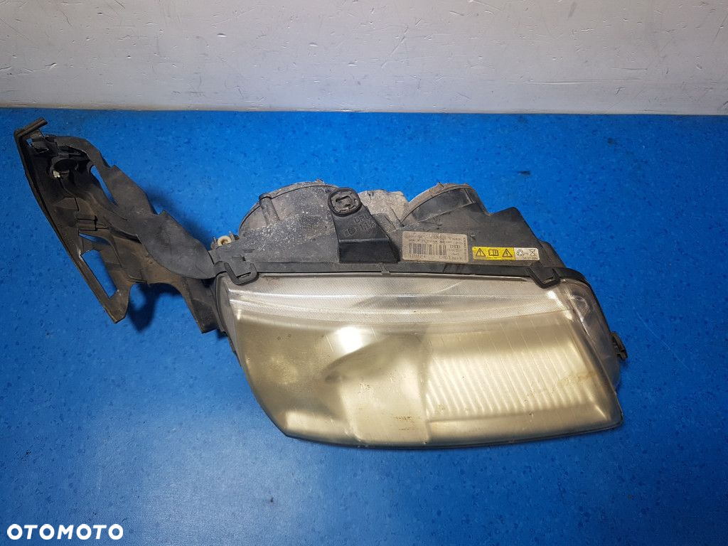 SAAB 95 REFLEKTOR XENON PRAWY - 3