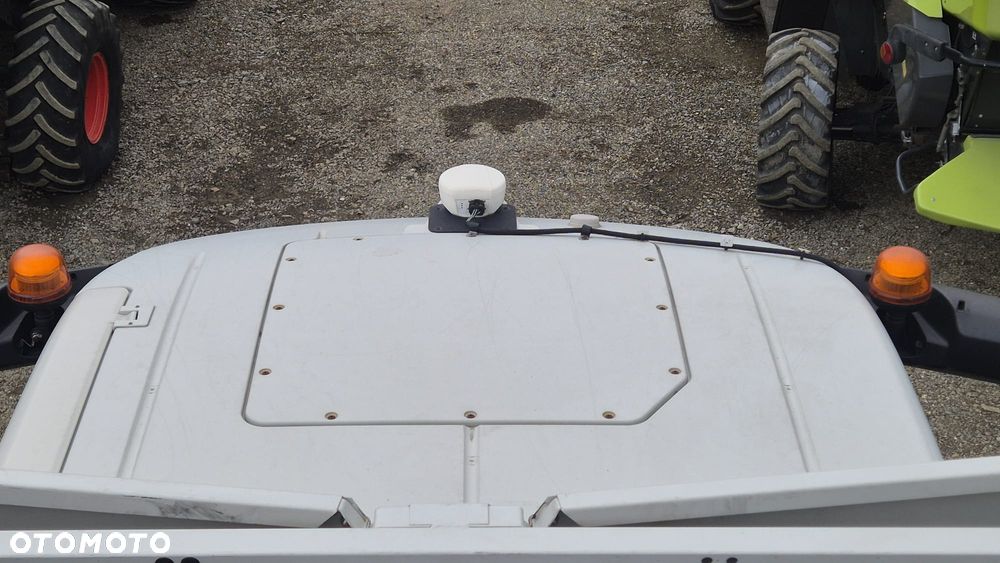 Claas Lexion 660 z hederem - 21