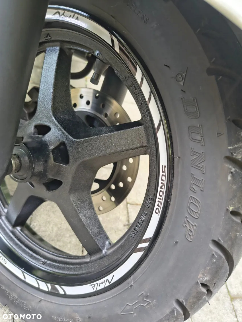 Suzuki Avenis - 5