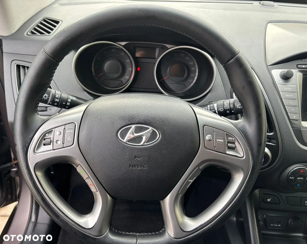 Hyundai ix35 blue 1.6 2WD Finale Gold - 15