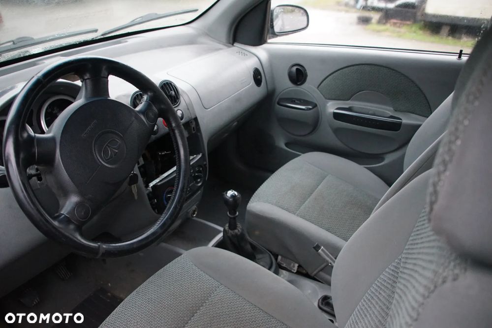 Auto na części - Daewoo Kalos 1.4 E-TEC II 94 KM F14D3 2005R Silnik Skrzynia Drzwi Maska Klapa Błotnik Zderzak Lampa Lusterko Klamka Deska Kokpit Sterownik Moduł Licznik Kierownica Panel - 8