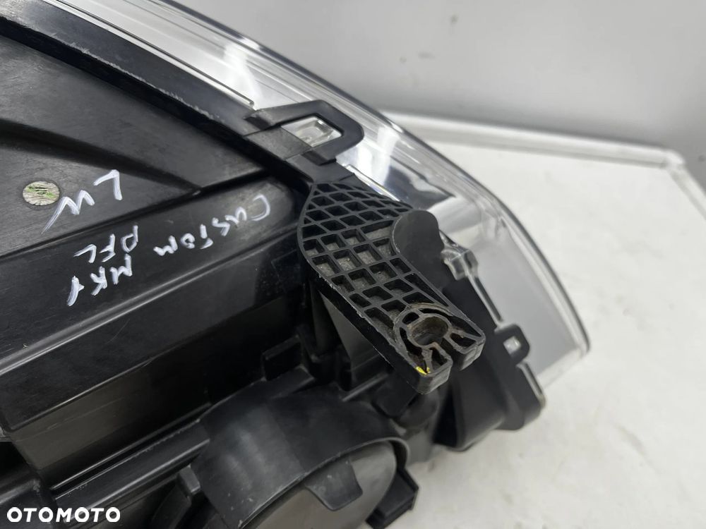 Lampa reflektor Ford Transit Custom MK1 13-17r. EU lewa przednia soczewka z doświetlaniem zakrętów E - 13