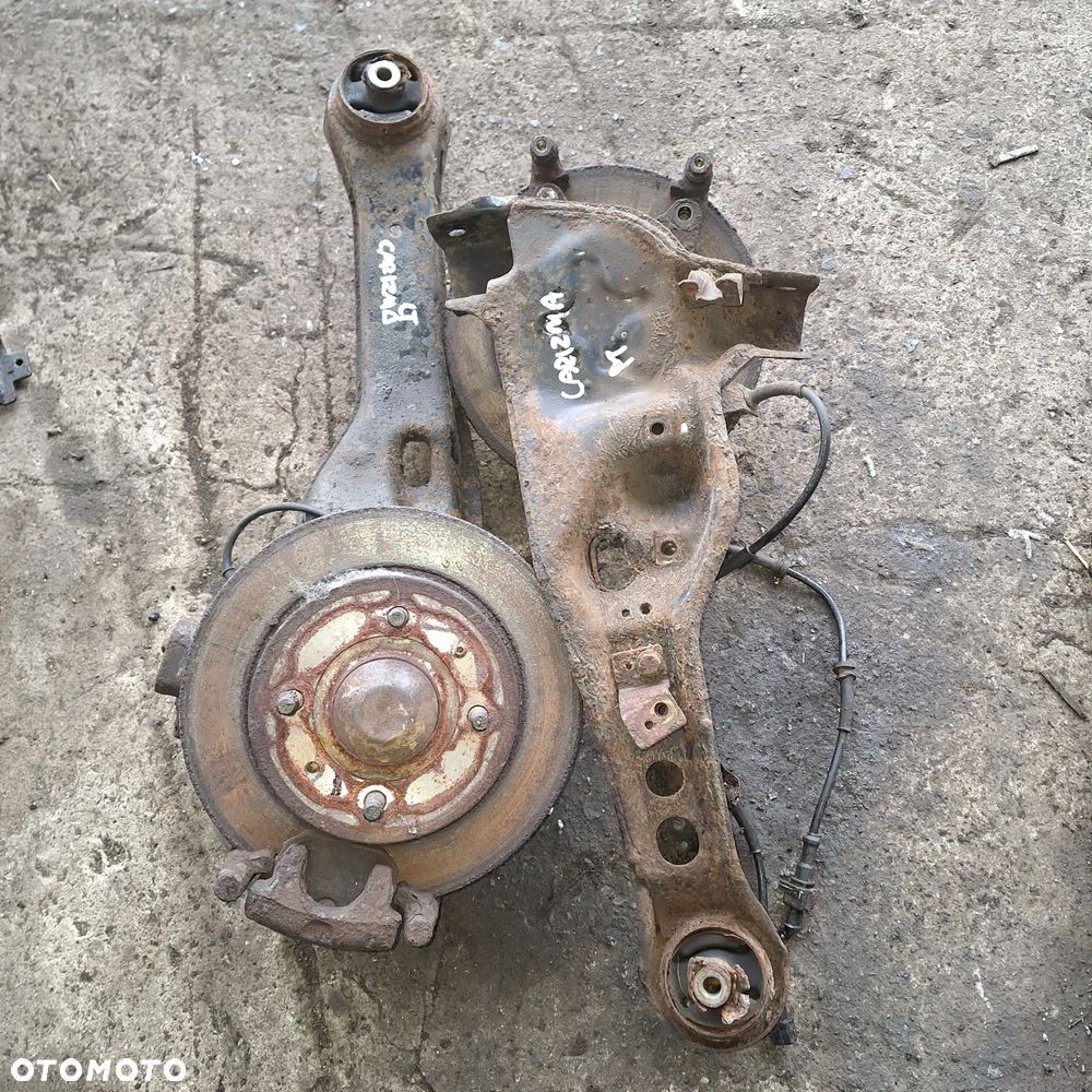 ZWROTNICA PIASTA PRAWA LEWA TYL TYLNA CARISMA 1.6 16V 1.8 VOLVO V40 S40GDI - 1