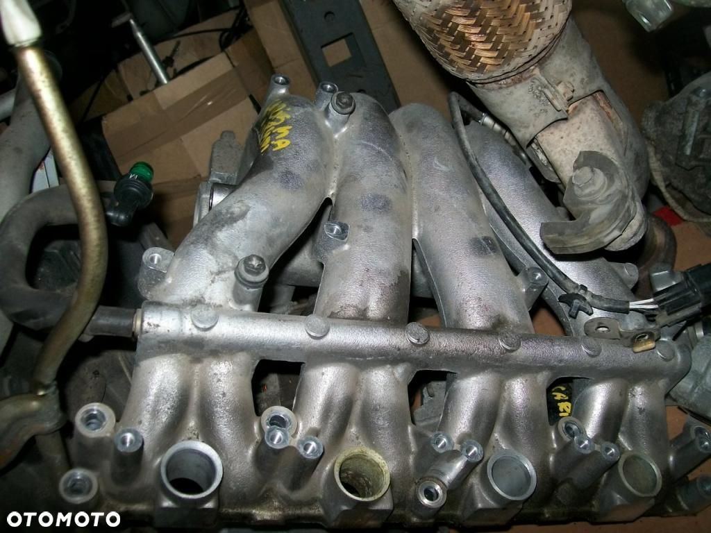 Kolektor ssący Mitsubishi Carisma 1.8GDI 00 lift - 1