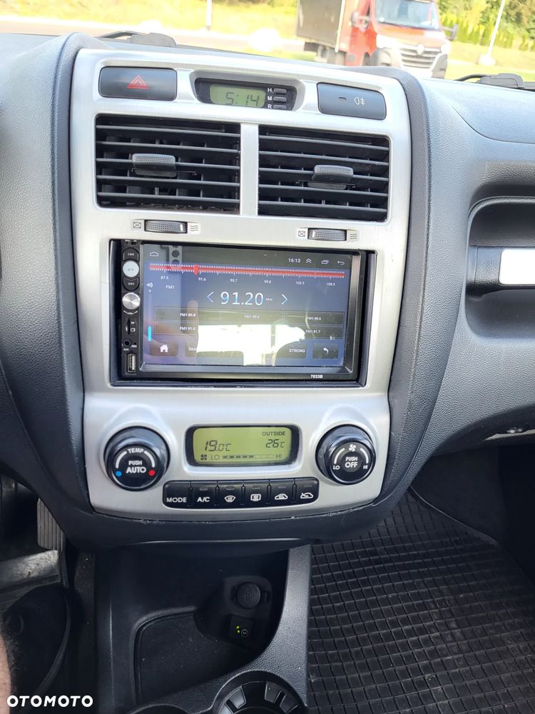 Kia Sportage - 4