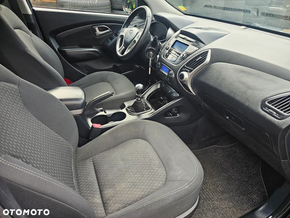 Hyundai Tucson 2.0 CRDi VGT 4WD GLS - 13
