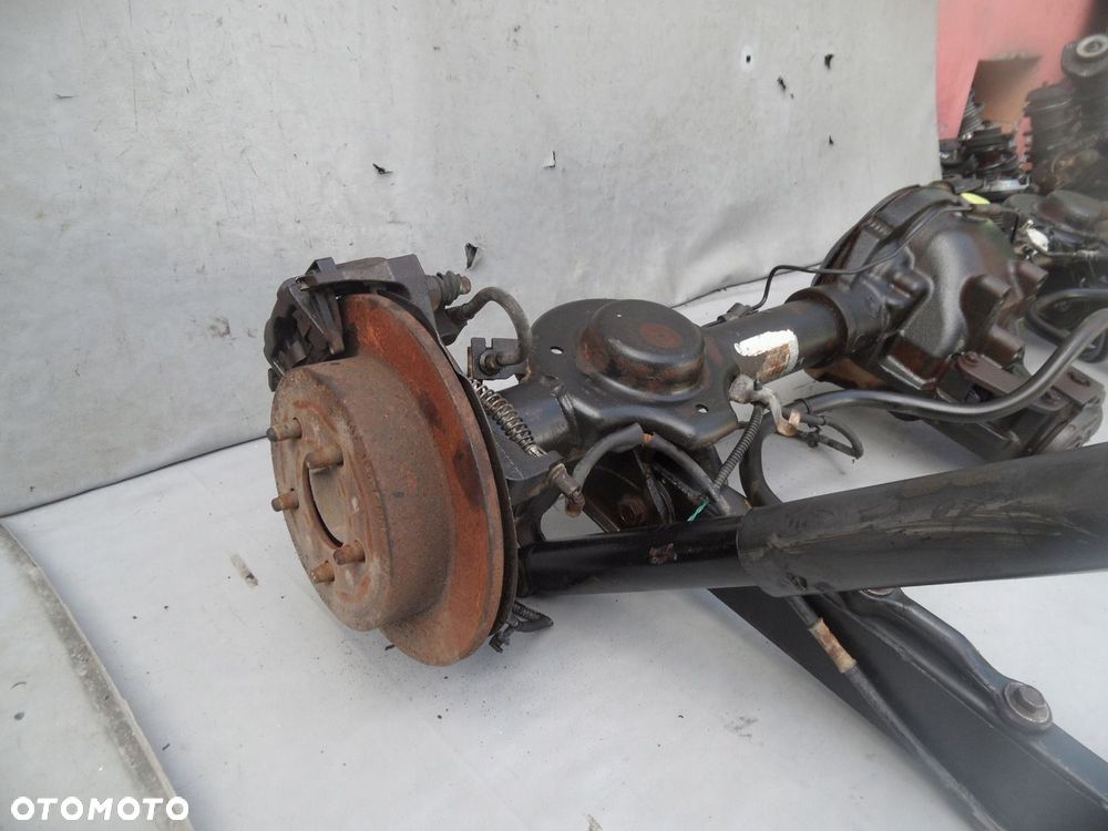 MOST TYŁ TYLNY JEEP CHEROKEE KJ LIBERTY 3.7 3.73 TARCZE - 2