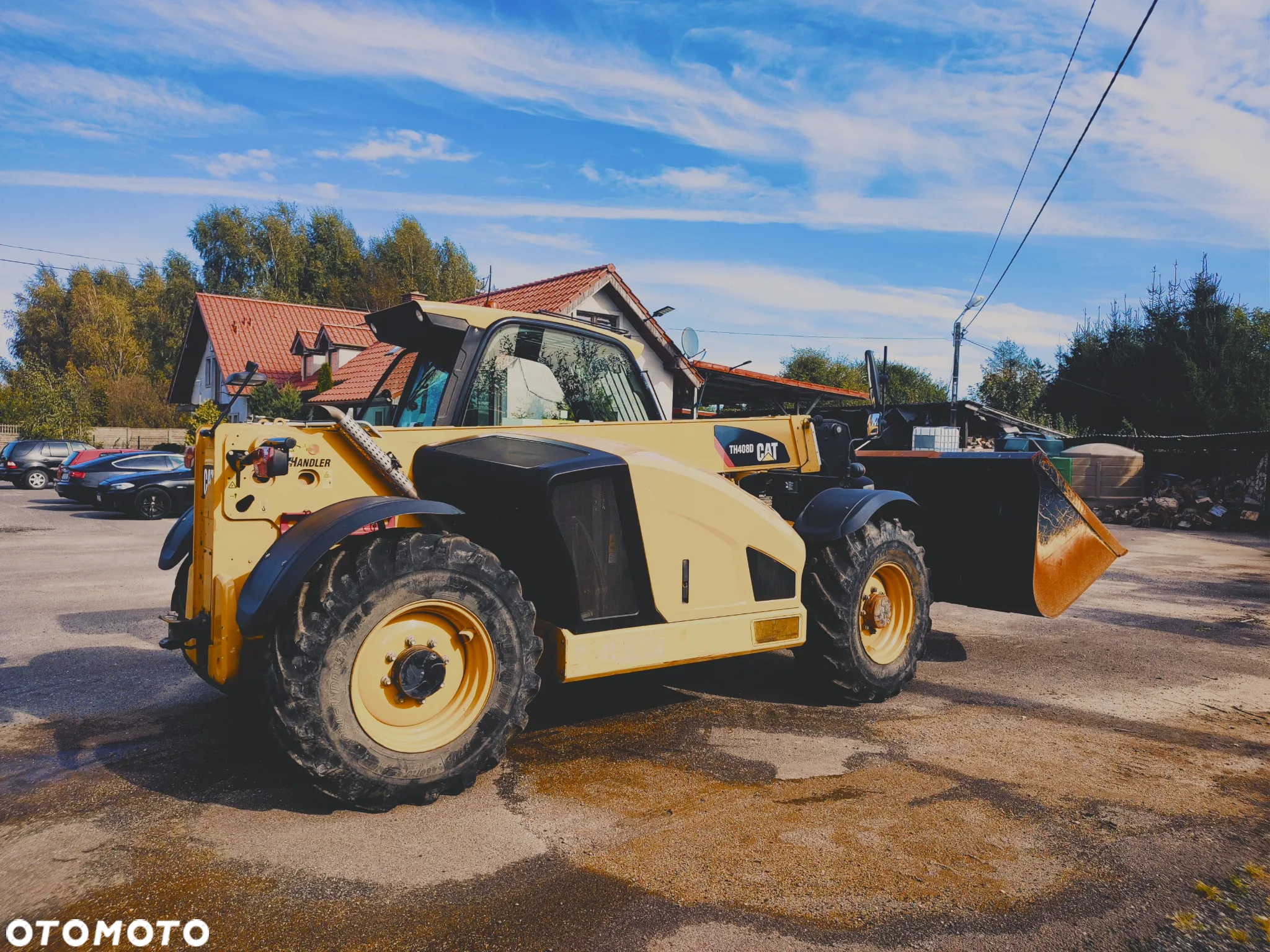 Caterpillar TH408 - 4