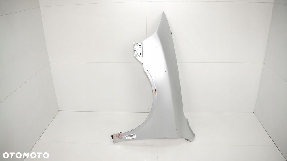 BŁOTNIK LEWY PRZÓD SKODA OCTAVIA II LIFT 08-13R LA7W - 12