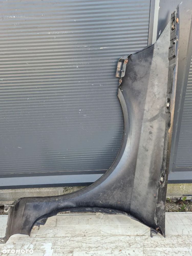 BŁOTNIK LAGUNA II PRAWY LEWY PRZÓD - 7