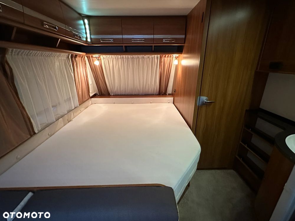 Dethleffs 550 NOMAD z przedsionkiem Isabella i łóżkami piętrowymi. - 32