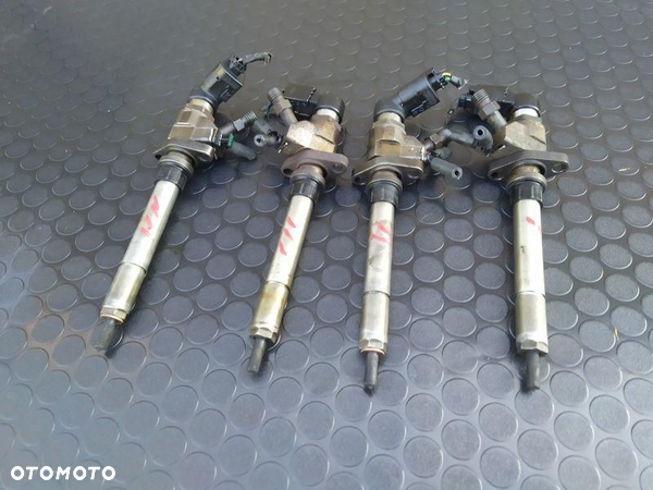WTRYSKIWACZ PALIWA 4SZT WTRYSKI KPL VOLVO 2.0 HDI 9657144580