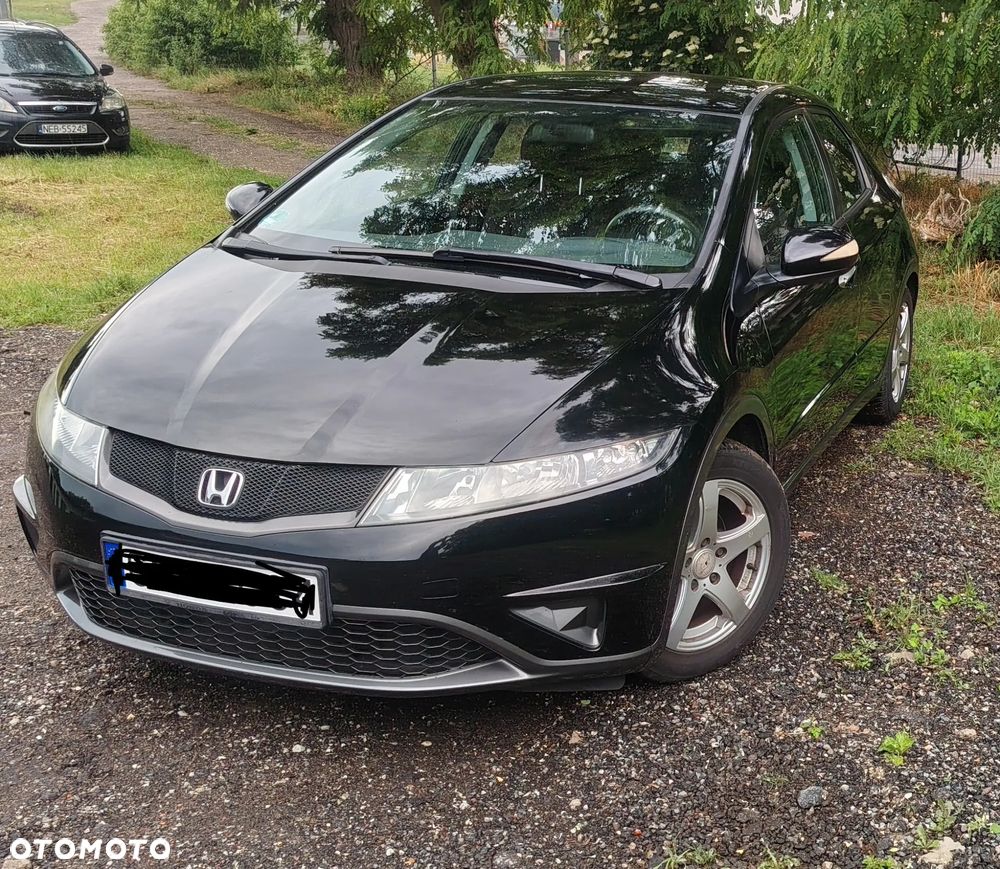 Honda Civic 1.4 Comfort - 1