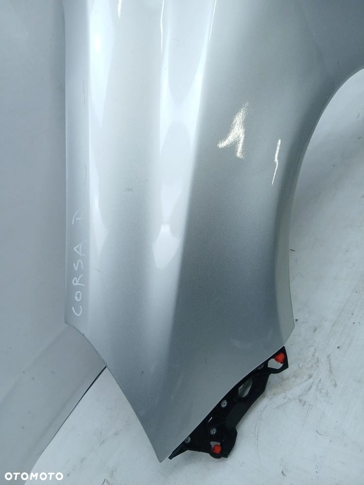 Błotnik przód przedni lewy Opel Corsa D - 2