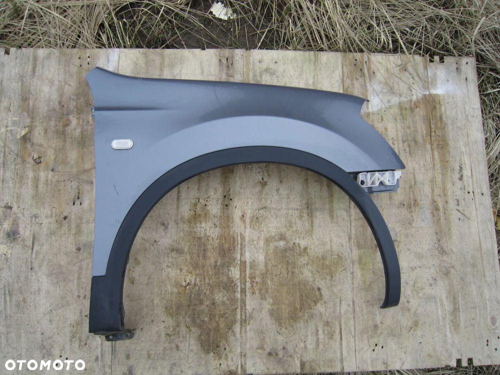 Błotnik przód przedni prawy Nissan Qashqai I J10 B52G